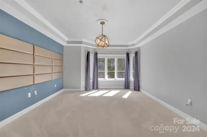 Primary bedroom with en suite bath.