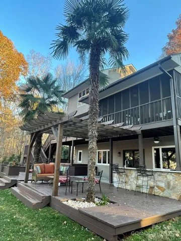 So many options for outdoor entertaining at this amazing waterfront home! Property also includes a greenhouse, garden shed, and chicken coop w/egg-laying chickens if buyer so desires!!