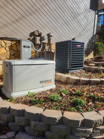 HVAC unit new in 2022. New Generac generator with 500 gallon buried propane tank which currently is used for that, gas fireplaces.