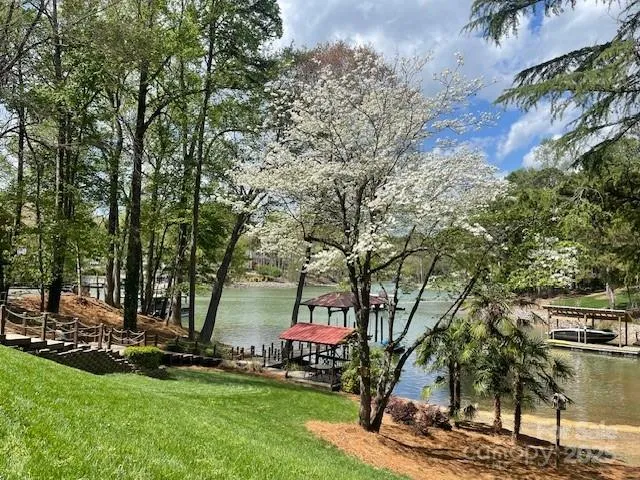Amazing waterfront home in McCrary Creek on Lake Norman close to shopping, restaurants, and award-winning schools. 175 feet of shoreline...