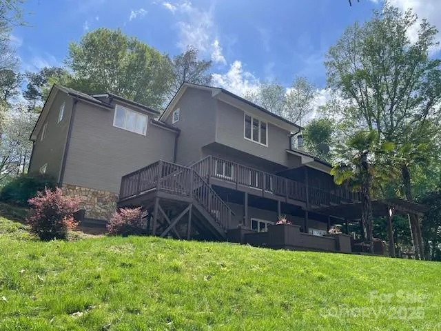 Home looks grand from the lakeside with the 3 floors.