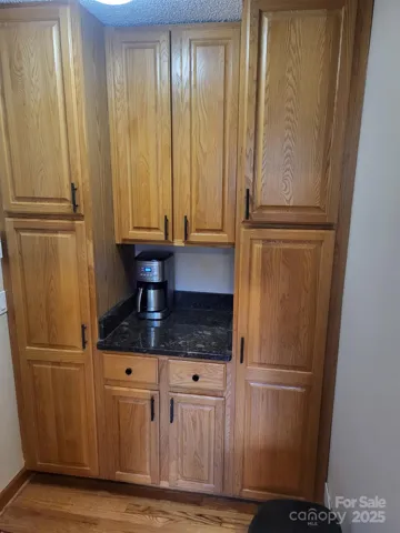 Panty/coffee bar area.Door to left leads to garage.