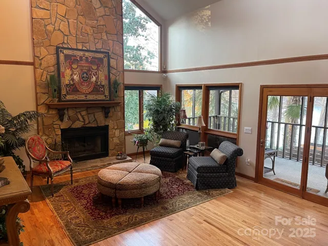 Great room features floor to ceiling gas stone fireplace.  Hardwood floors have just been redone. Entire interior of home has also just been painted neutral colors.