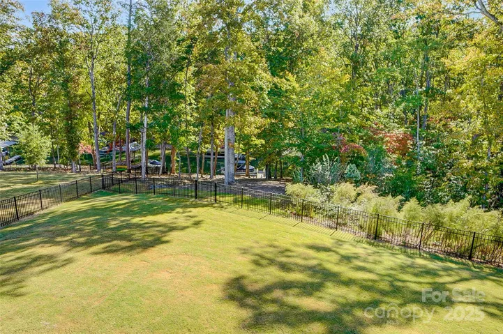 Relax on the spacious screened deck, entertain on the extended patio in your private fenced backyard, enjoy watersports from your floating dock, or head down to the community pool to cool off