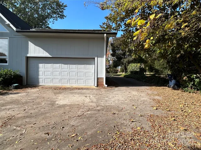 Rear load garage with lots of parking for guests.