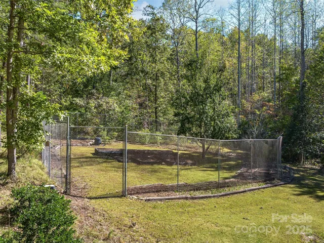Fully fenced garden area gravity or pump fed water from roof fed holding tanks.