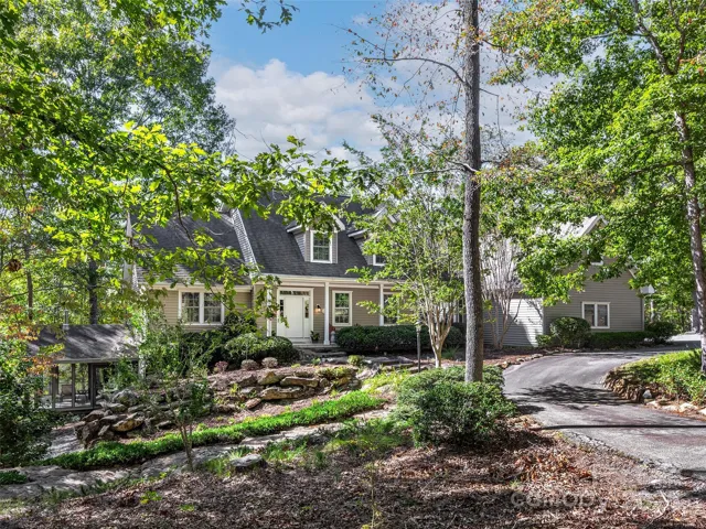Nestled away from the road provides privacy. A circular drive with plenty of parking in multiple areas