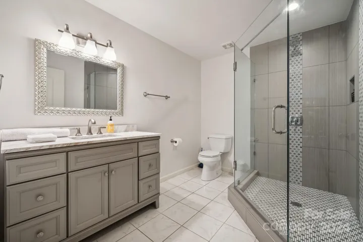 Lower level bedroom & full bathroom.