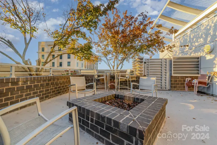 Outdoor firepit by pool on 7th floor