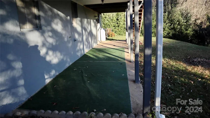 Partially covered patio off basement