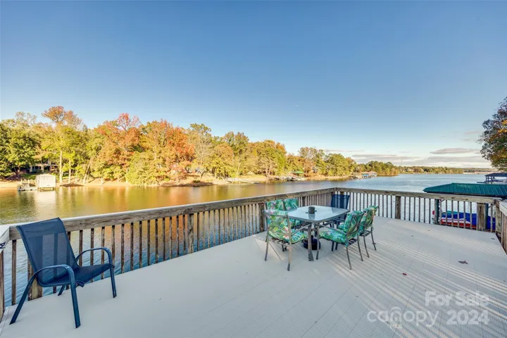 Expand your outdoor living with this unique double-decker dock design and upper level sprawling sun deck.