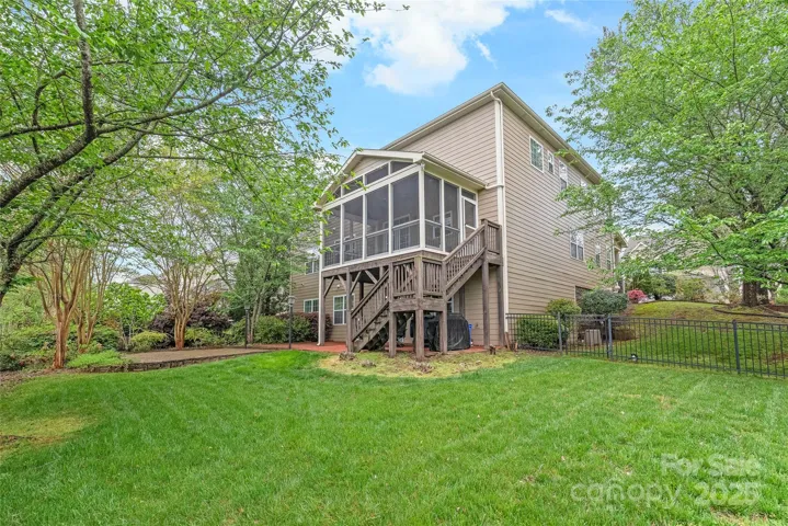 Spacious corner lot with mature landscaping. The Camelias are blooming, and the Azaleas are just starting to pop.