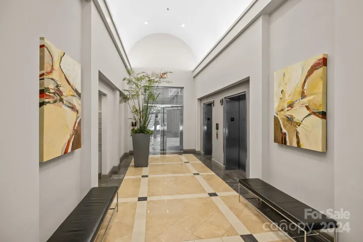 Stylish, immaculate lobby with entrance from both the street and courtyard. Two large elevators serve and building and parking decks. Secure access into the building.
