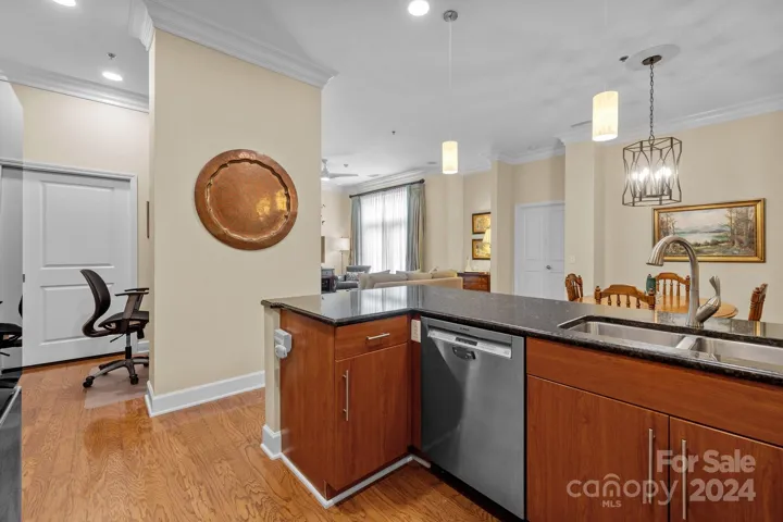 With open sight lines to the dining and living areas, the kitchen provides easy engagement with guests or family members while cooking.