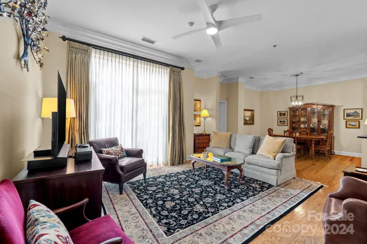 Spacious living room combines style and function, creating a comfortable, refined setting that is idea for daily living and social gatherings.