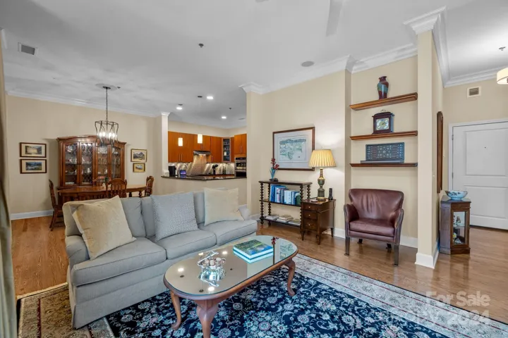 Open sight lines between the foyer,  living and dining areas and kitchen create a feeling of spaciousness and connection.