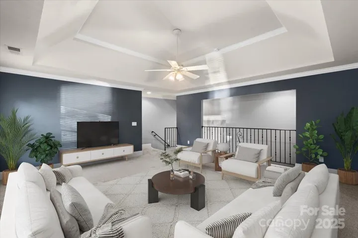 Virtually staged loft/flex area on upper floor.