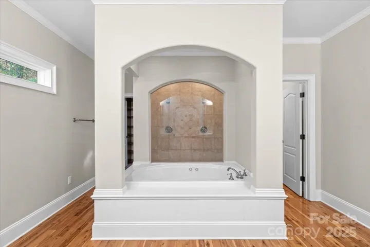 An elegant primary bath - en suite