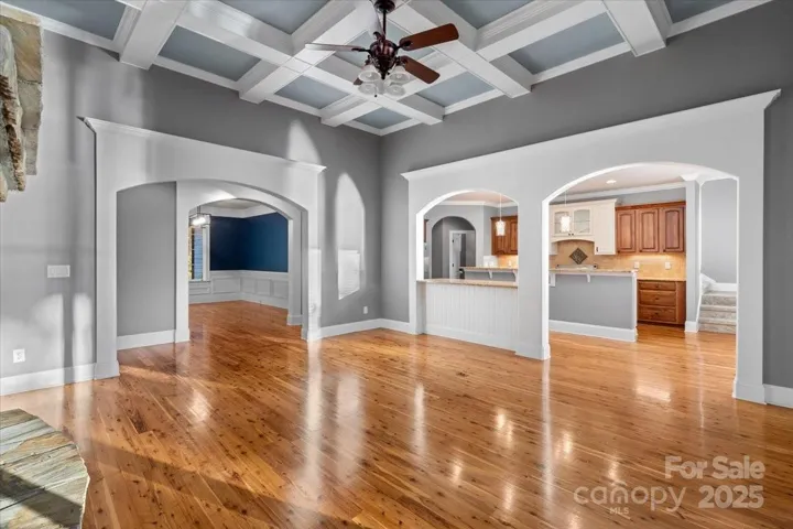 An open floorplan with just enough visual break from each area is great use of spaces throughout this home