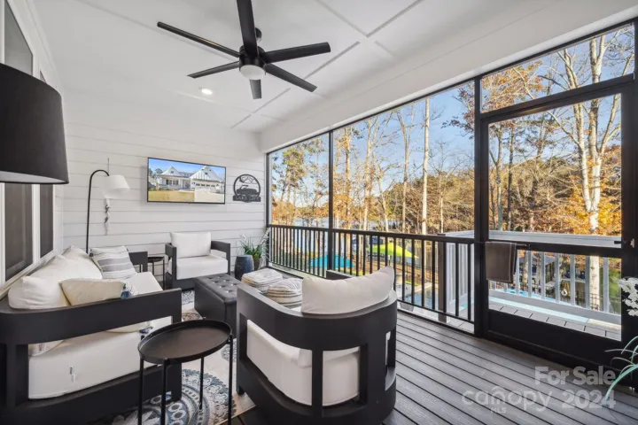 Enjoy your morning coffee on the screened porched. Decking is Teck decking for less maintenance.