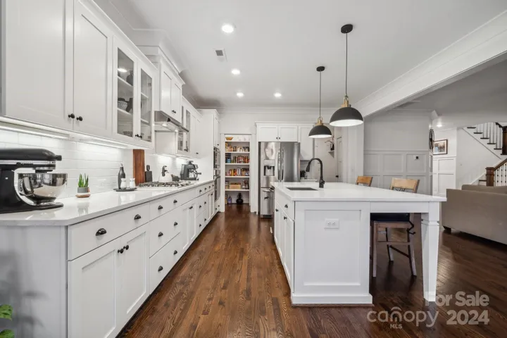 Plenty of cabinets, drawers and walk in pantry.