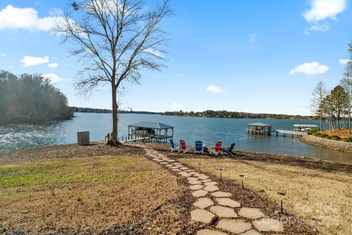 Follow the path to the perfect outdoor gathering spot around the fire pit area.