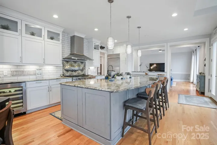 Opens to family room and extended deck overlooking amazing lake views