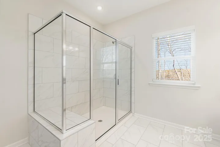 glass and tile primary shower