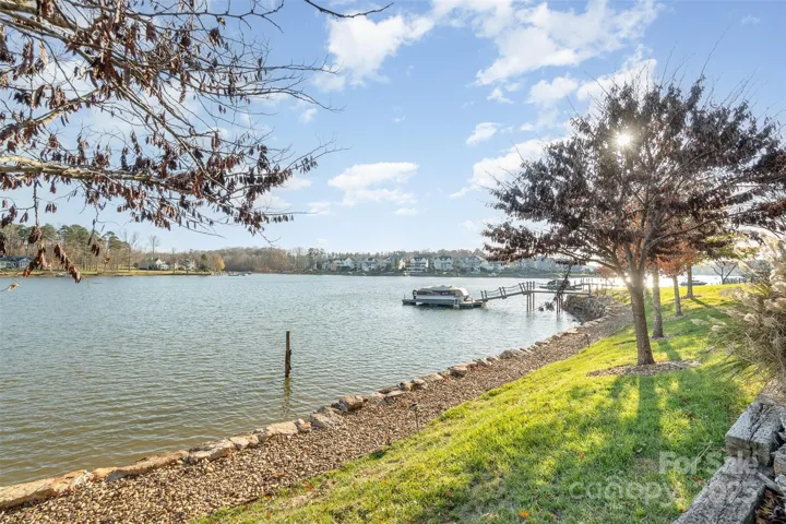HOA maintained lawns, full lawn maintenance (shrubs, bushes, mulching), walking trails, dog park, large community fire pit with 8 chairs, sea wall, septic system and community well.