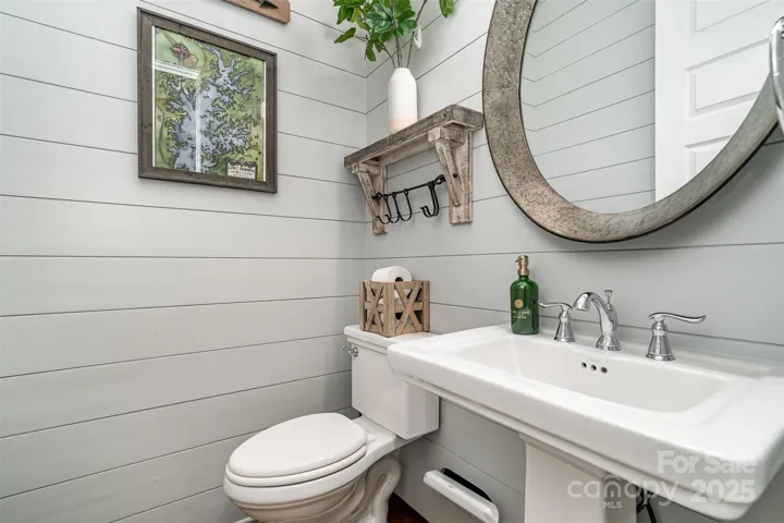 Guest half bathroom with custom shiplap