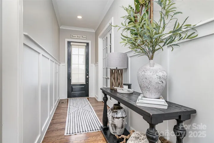 Foyer greets you with gleaming floors.