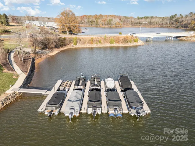 The community dock features a deeded boat slip and lift, all expertly maintained by the HOA for a hassle-free boating experience!