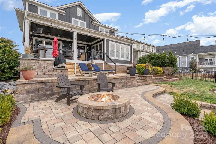 Exquisite custom outdoor living space is an entertainer's dream with breathtaking lakeviews