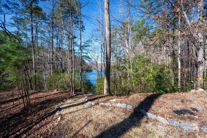 A trail leads down to a secluded cove