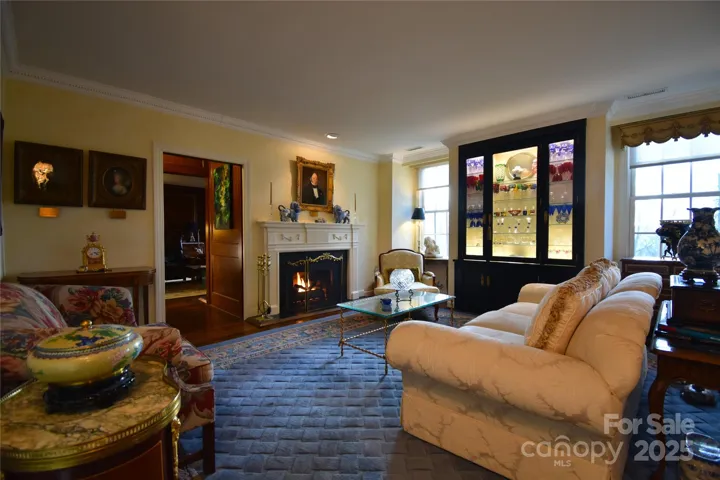 Cozy up by the living room fireplace. One of four in this double unit.