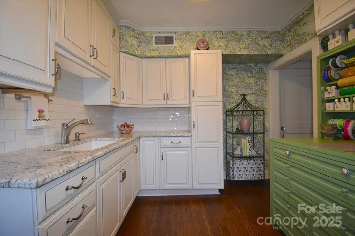 Beautifully updated with new custom cabinetry and countertops.