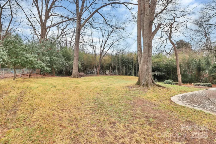 Over one acre lot with beautiful backyard.