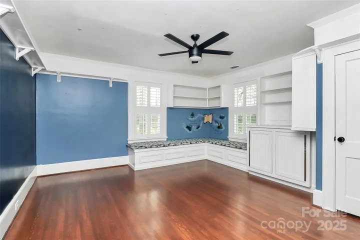 One of 4 spacious bedrooms on the 2nd floor with built-ins and storage.