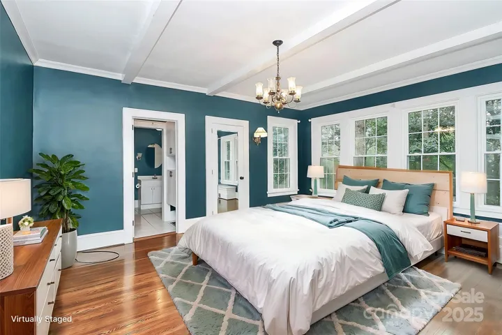 2nd view of primary bedroom with virtual staging.