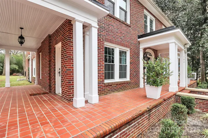Covered wrap around porches are perfect for enjoying the upcoming Spring days.