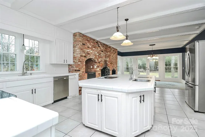 Huge kitchen with newer stainless-steel appliances. (2020)