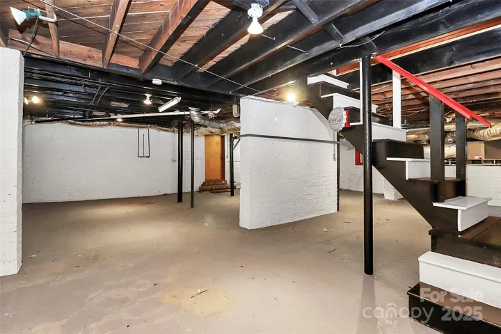 Unfinished basement with encapsulation completed in last few years.