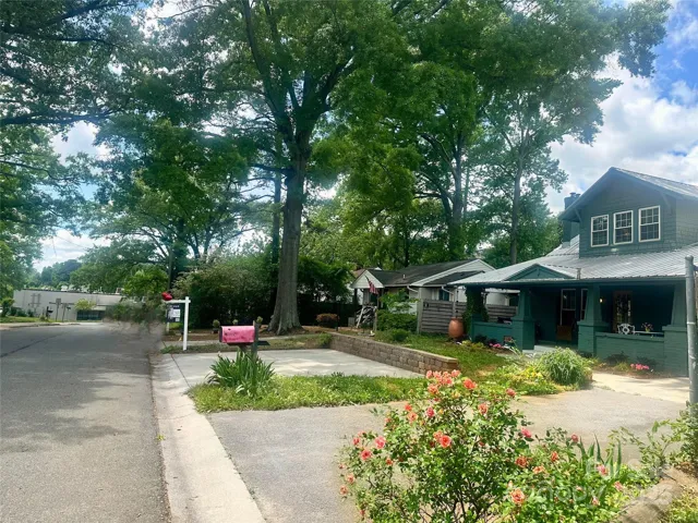 Convenient proximity to Amelies at the end of the street visible in the background with the CLT skyline visible from the yard
