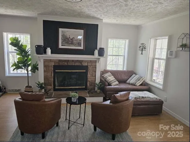 Cozy gas fireplace. LVP throughout the home.