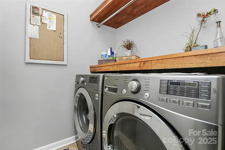Laundry has Custom Shelving NEW Washer/Dryer Remain!