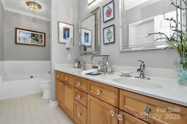Primary Bath is updated with NEW Shower door and plumbing fixtures.