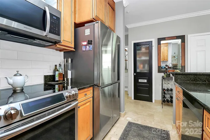 New Appliances and custom Pantry Door & Closet.