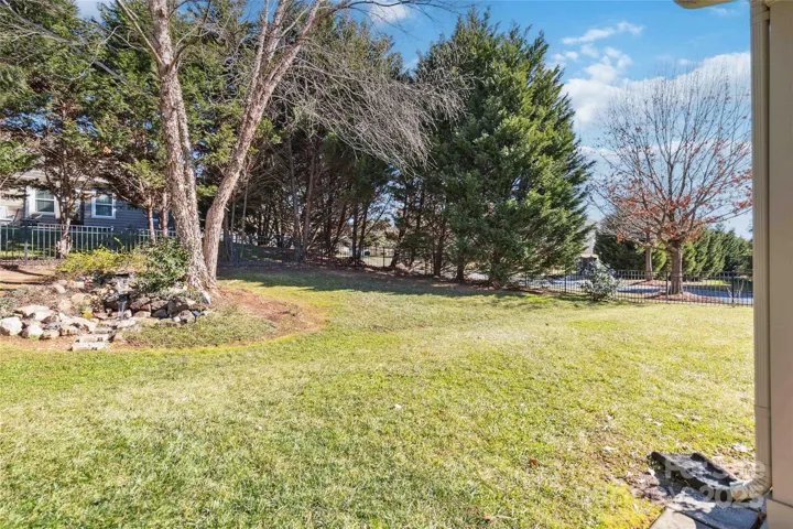 Large fenced corner lot