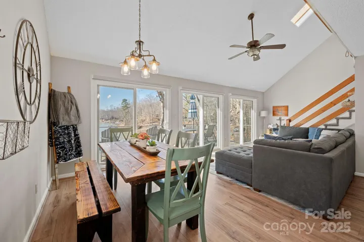 Vaulted Dining Area/Living Room with LVP floors feature spectacular Water Views!