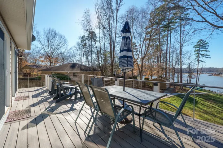 Spend quality time relaxing on your sprawling deck & breathing in the natural beauty of your private, serene lot with breath taking Water Views!